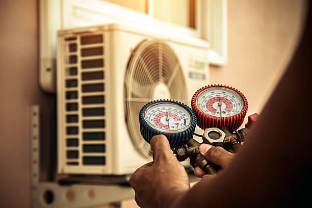Professional Hvac technician working in Versailles, NY
